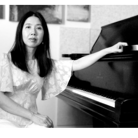 Woman sitting at piano